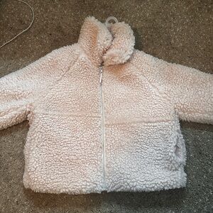 A new day puffer jacket size XL , it’s brand new never been worn and light pink